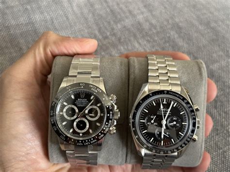 omega vs rolex chronograph